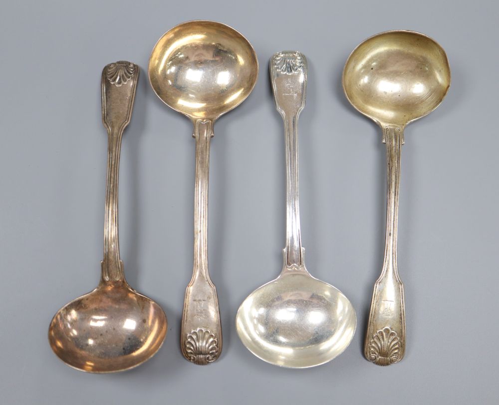 A pair of William IV silver fiddle, thread and shell pattern sauce ladles, Lias & Lias, London 1830 and a later Victorian pair,